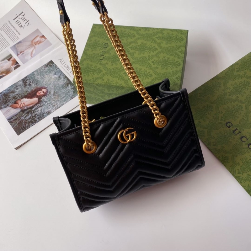 G*u*i shopping bags